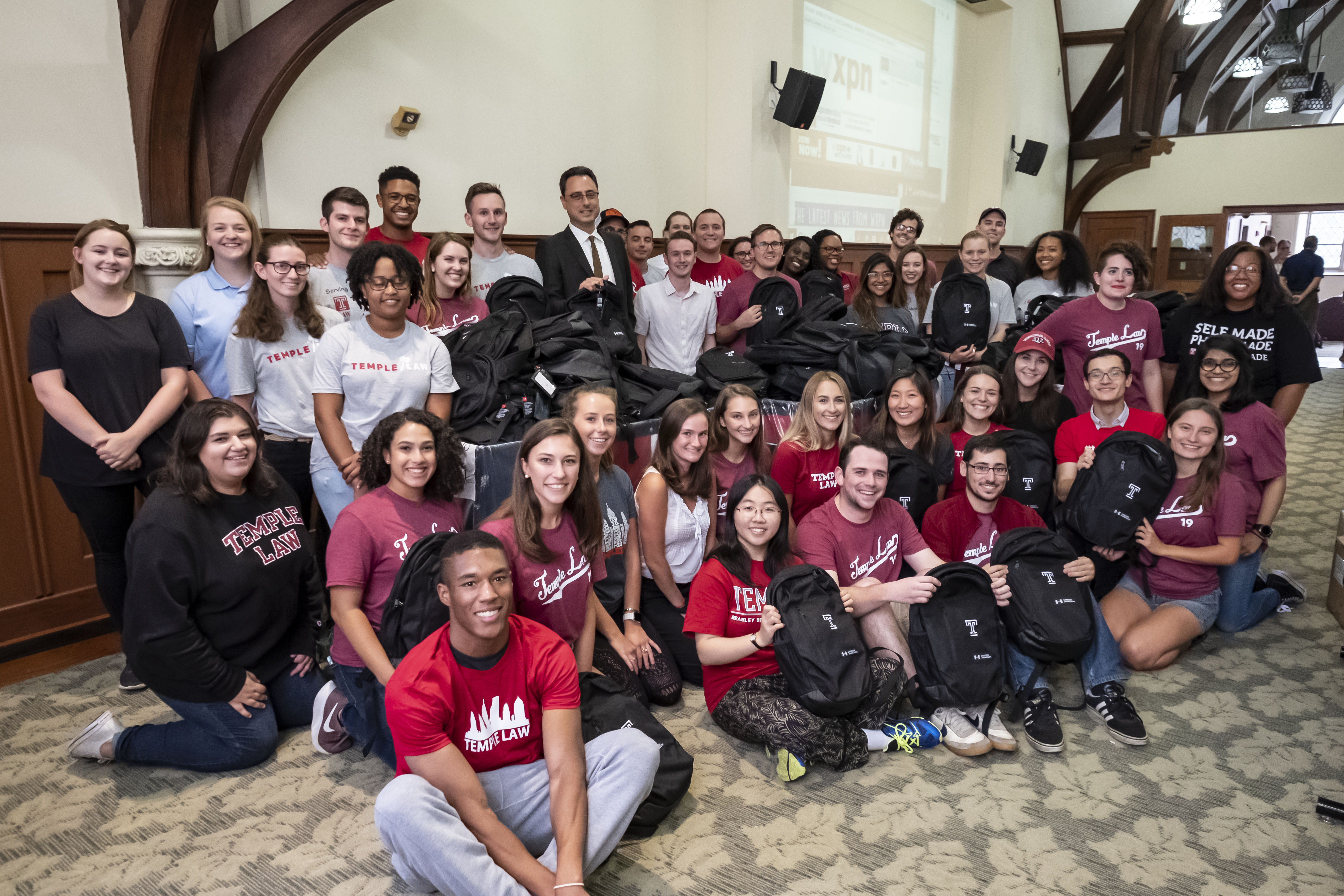 Temple Law students packed school supplies for children in Shusterman Hall as part of a community service project.
