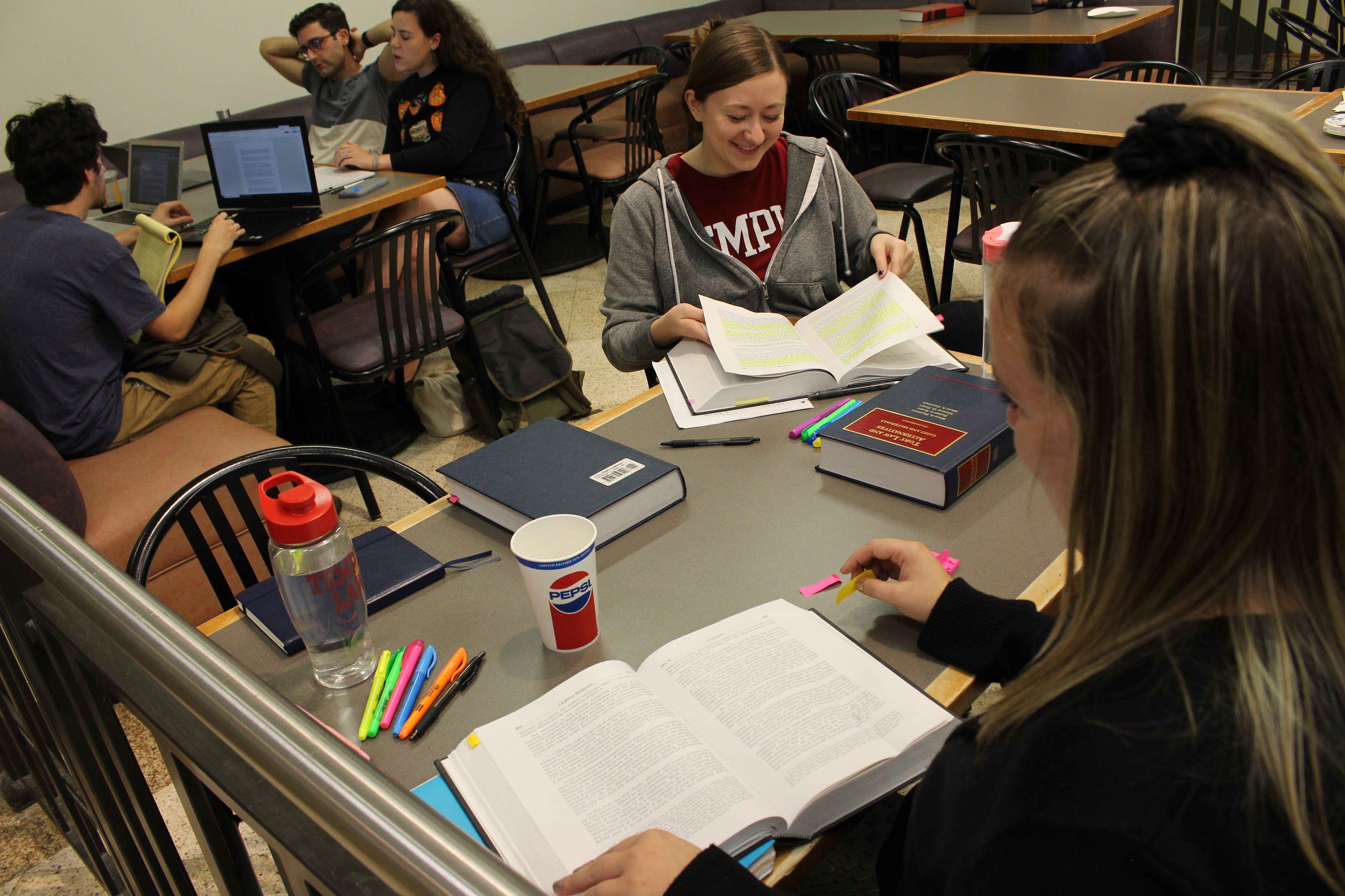 Temple Law students preparing for Introduction to Transactional Skills in October of 2018 in the Klein Hall cafe.